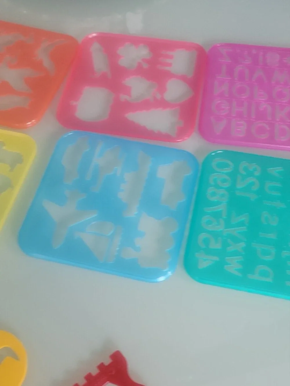 vintage Tupperware Tuppertoys Stencil Art templates from the late 80s.